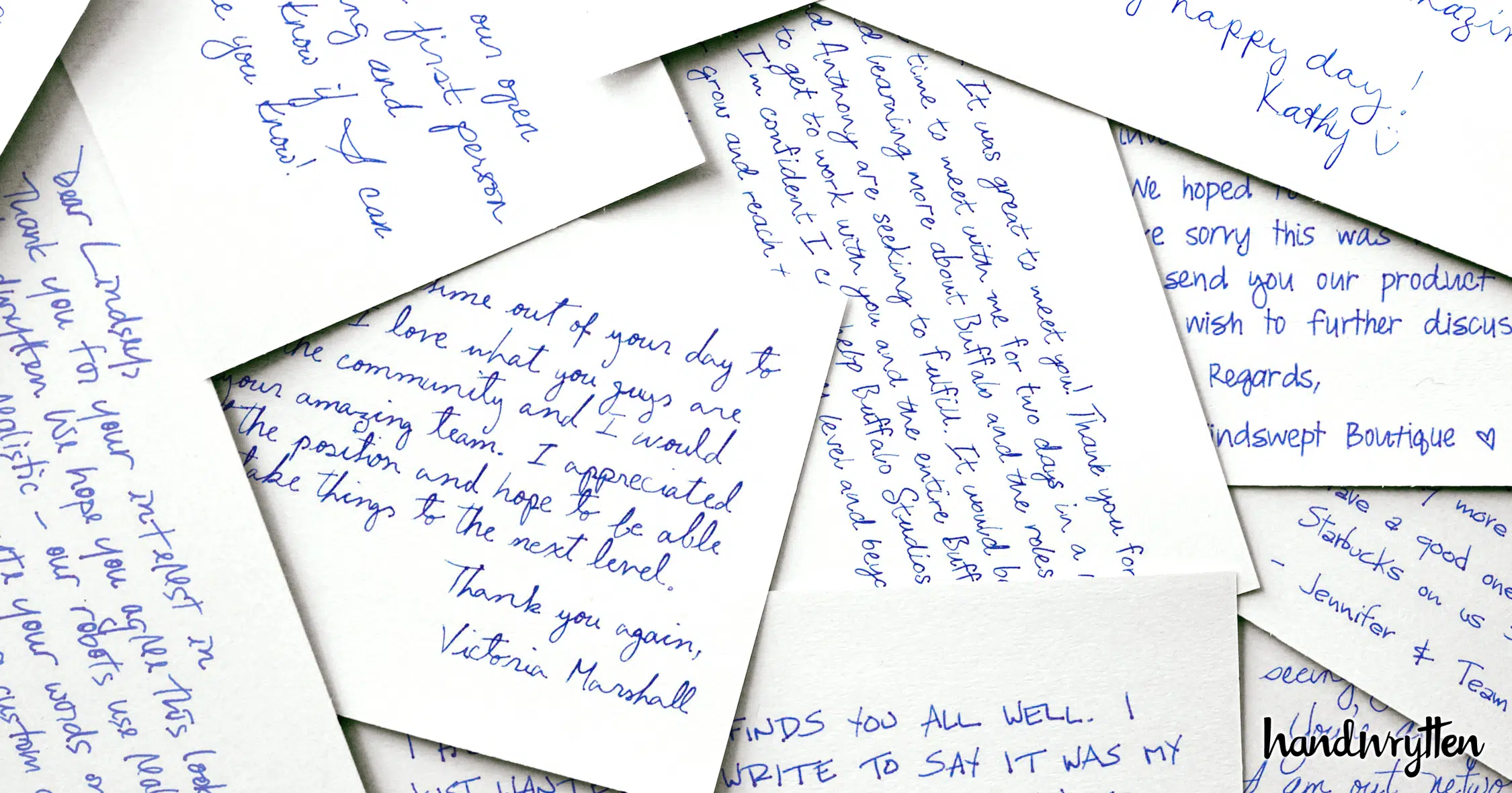 pile of handwritten notes with Handwrytten in bottom right